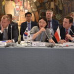 Representatives from Sweden, South Korea, and Poland at the 5th IPNDV Plenary